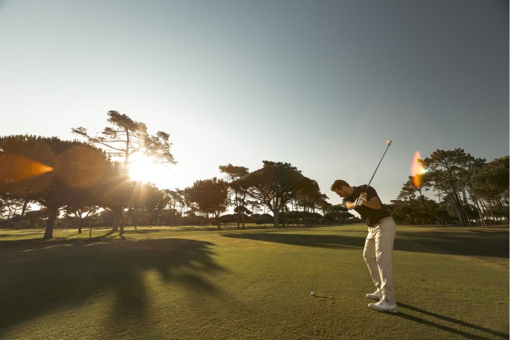 Man playing golf