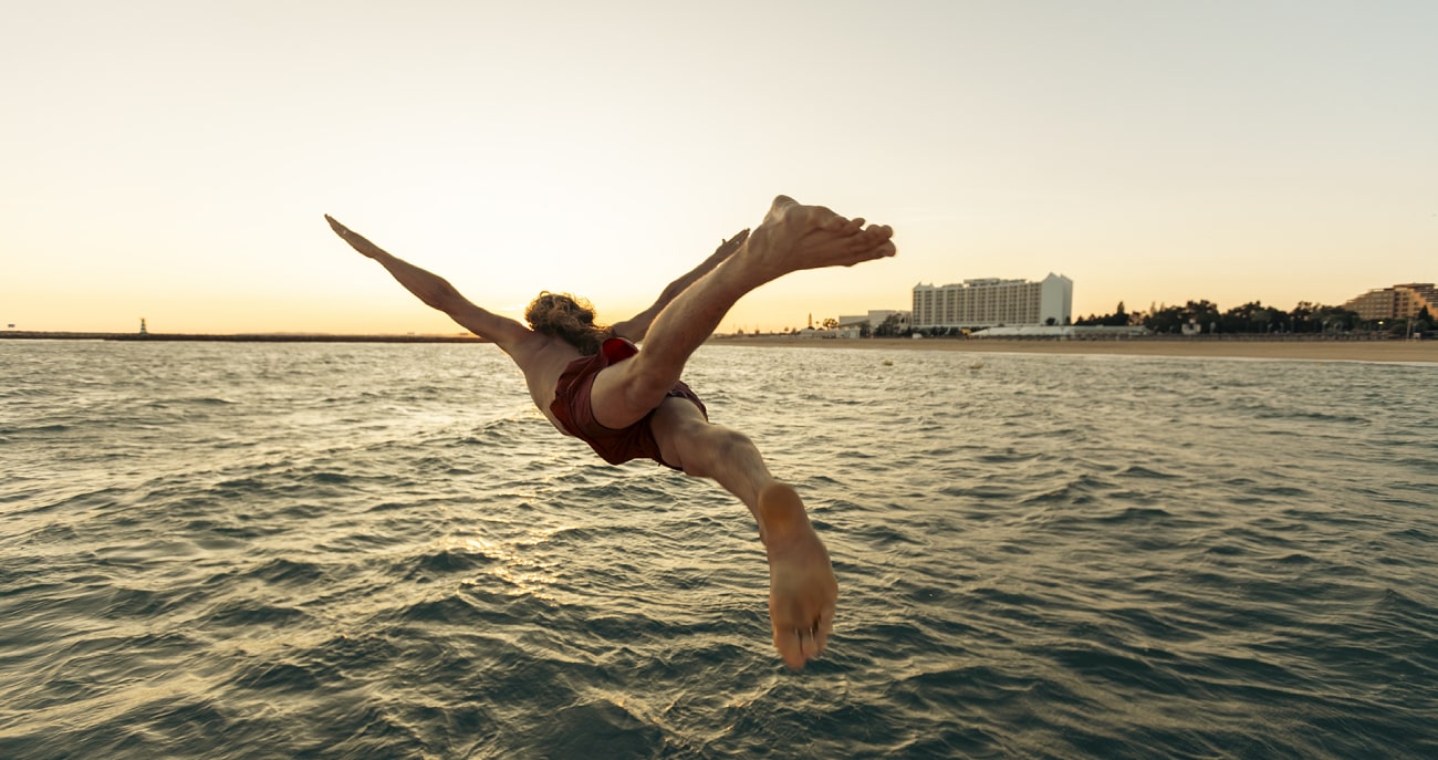 man diving in vilamoura's sea